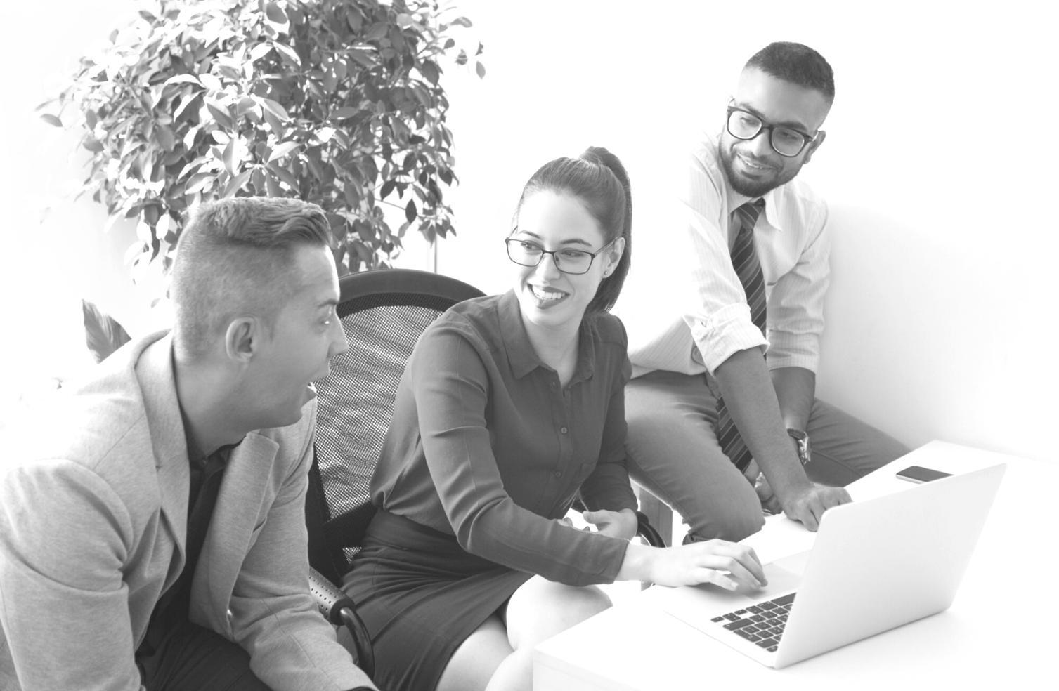 Cybersecurity analyst reviewing vulnerability assessment reports and security data